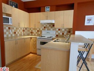 Photo 2: 50 15065 58TH Avenue in Surrey: Sullivan Station Townhouse for sale in "Springhill Complex" : MLS®# F1210016